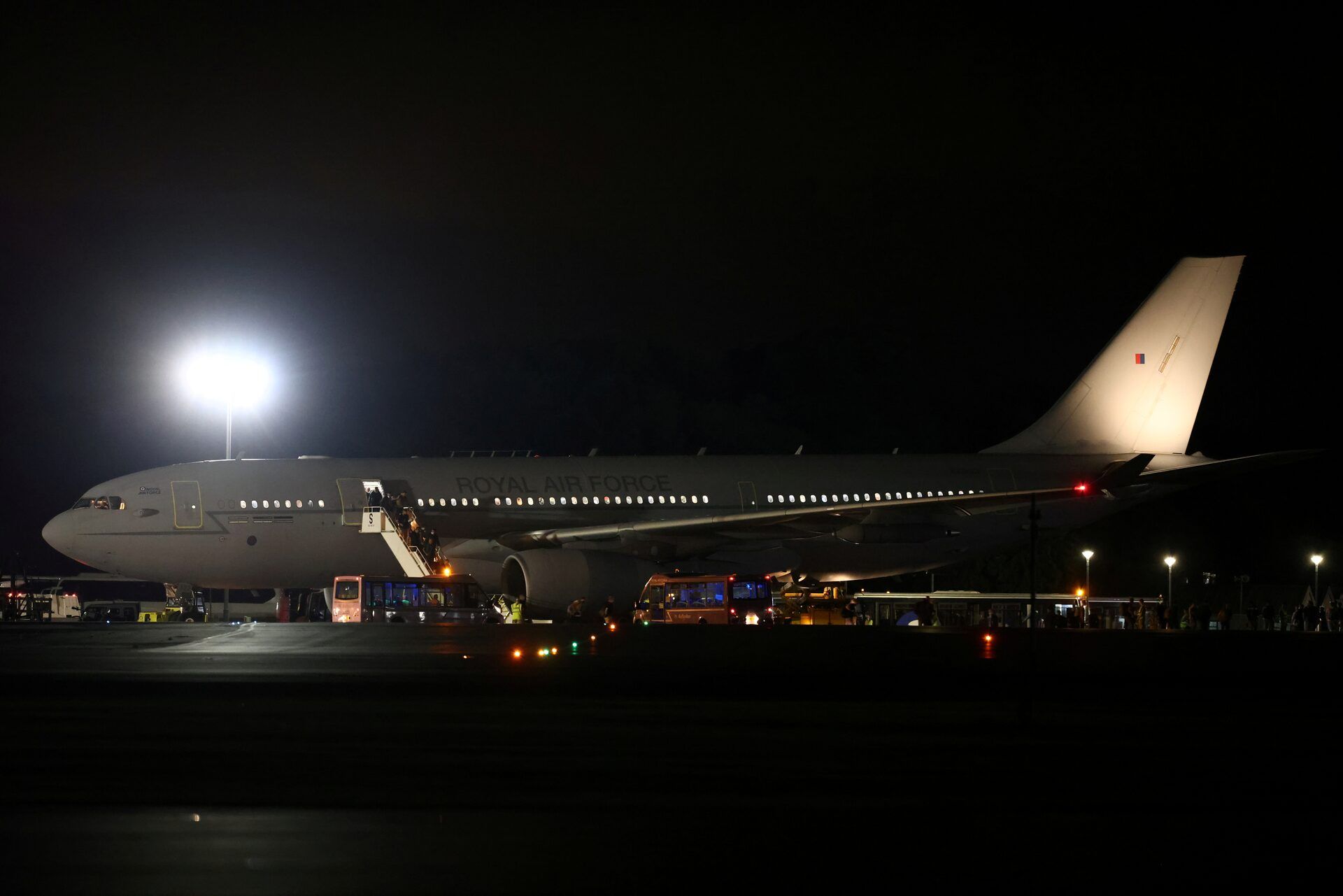 People disembark the RAF Voyager aircraft, upon arrival from Afghanistan, at the RAF Brize Norton, in Oxfordshire, Britain, August 17, 2021 