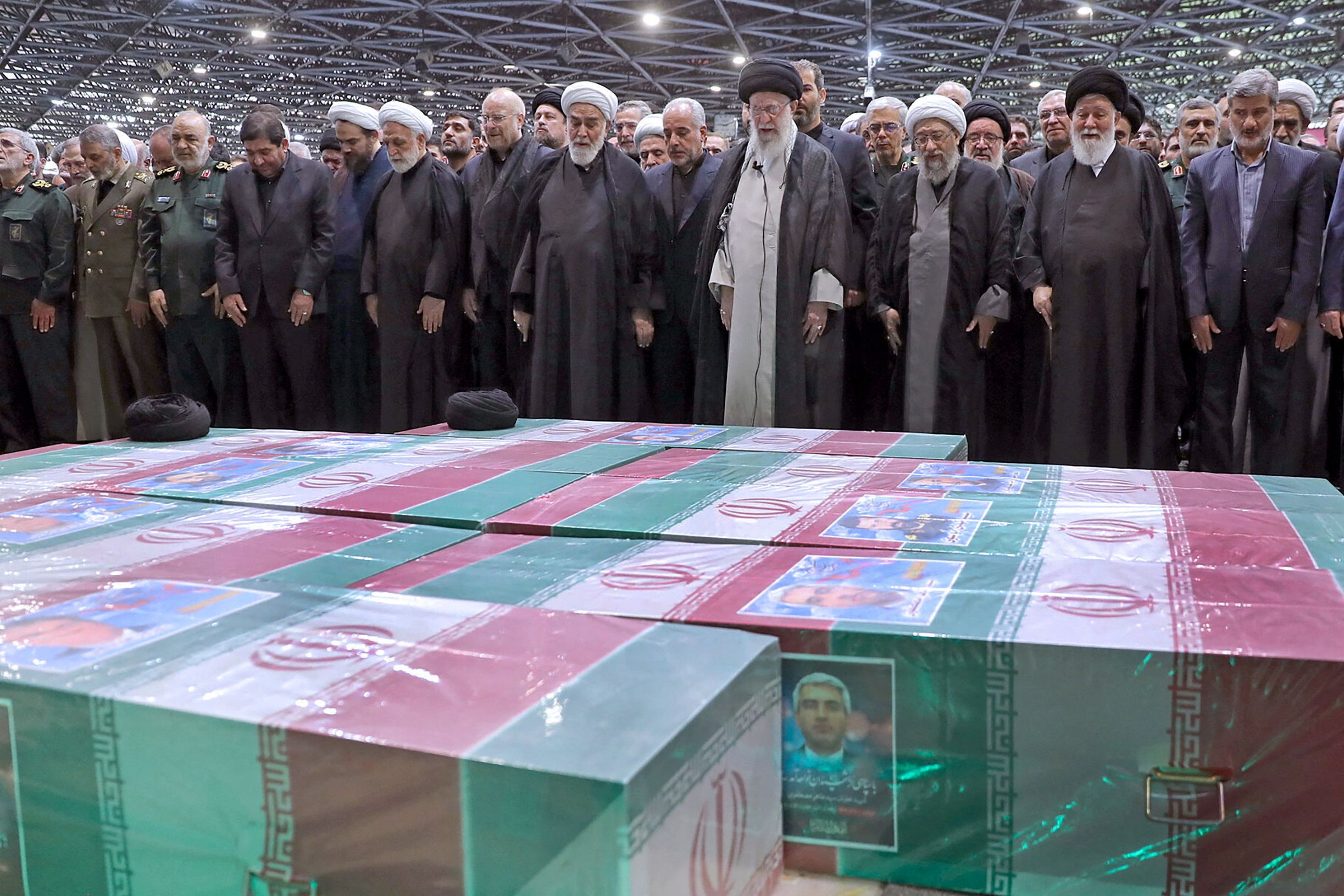 Iran's Supreme Leader Ali Khamenei and other top leaders at Raisi funeral on May 22, 2024