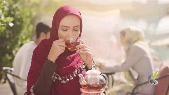 An Iranian woman in a TV commercial for a brand of tea in Iran