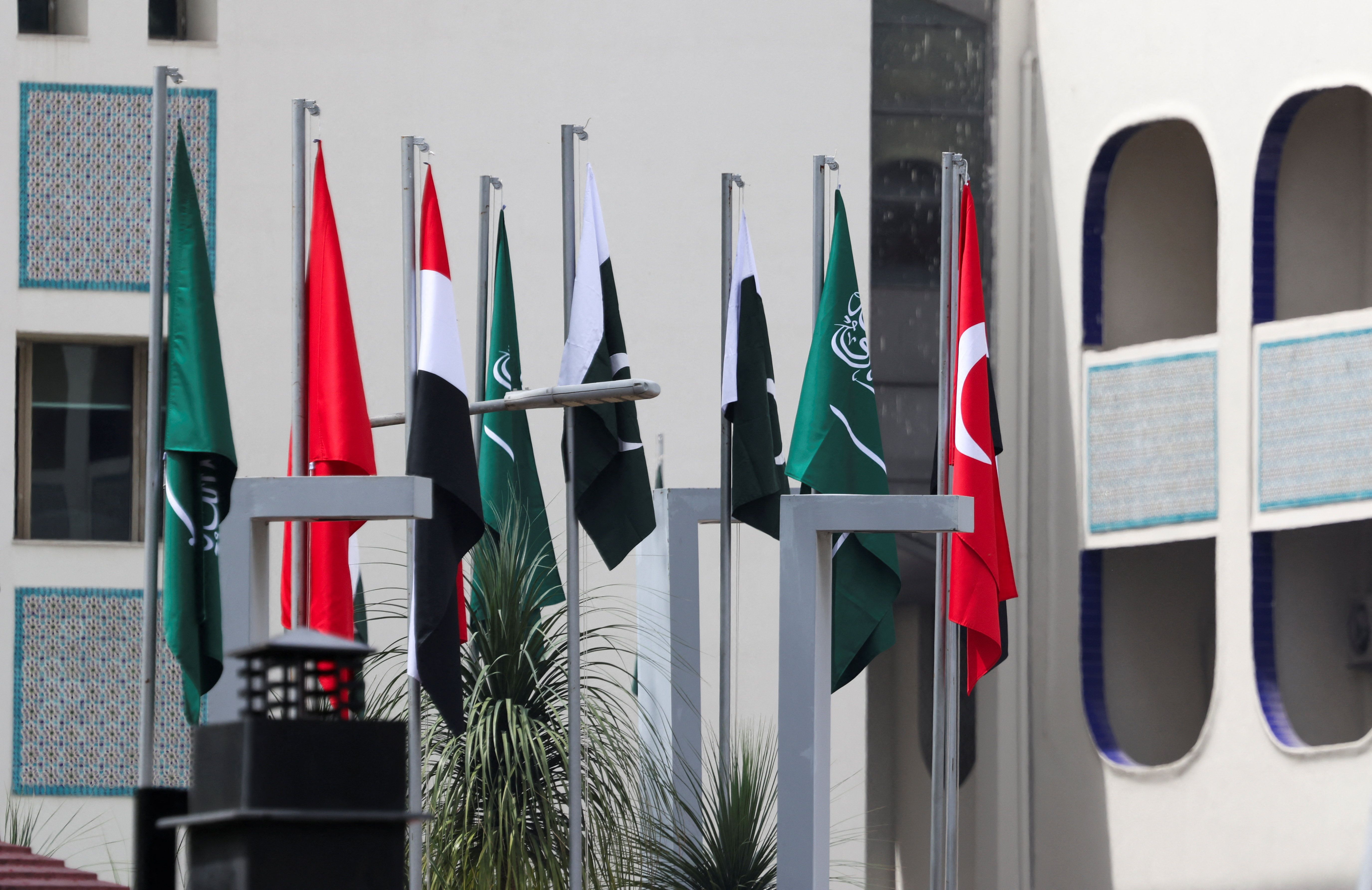 The national flags of Pakistan, Saudi Arabia, Turkey and Egypt stand hoisted outside the Ministry of Foreign Affairs office, on the day Pakistan hosts talks with Saudi Arabia, Turkey and Egypt to discuss regional de-escalation in Islamabad, Pakistan, March 29, 2026. 