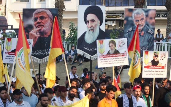 US Sanctions Iran-Backed Group, While Releasing Funds For Tehran