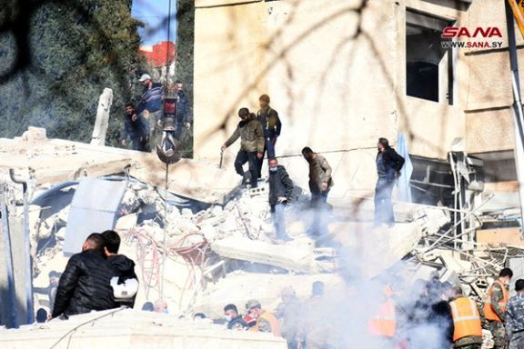 People inspect the damage at the site of an Israeli strike, according to sources, in the Mazzeh neighborhood of Damascus, Syria January 20, 2024