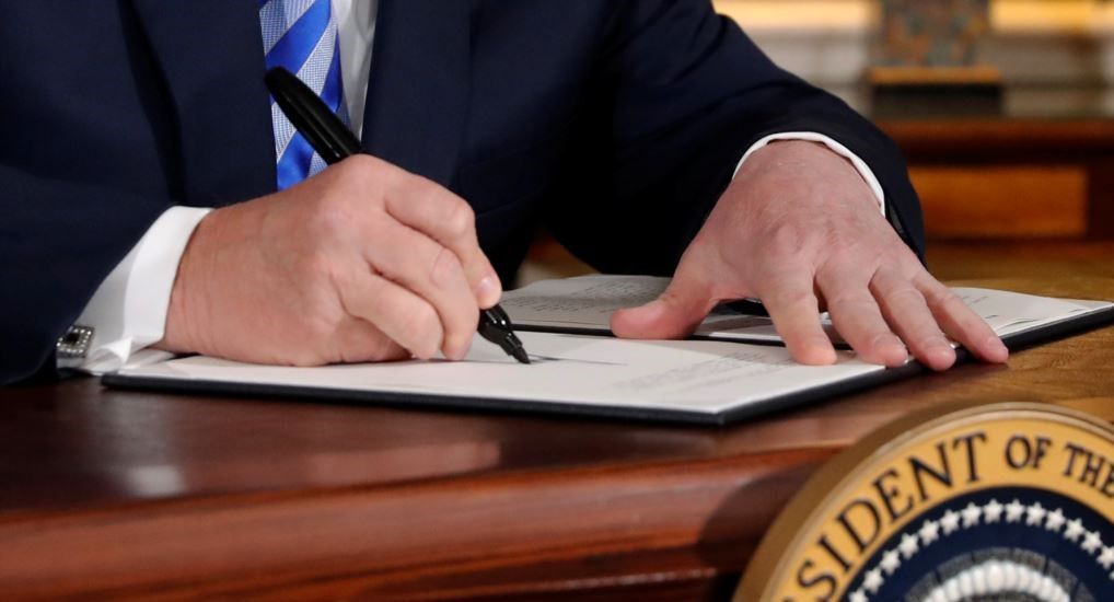 Former US president Donald Trump signing the withdrawal from the JCPOA in May 2018