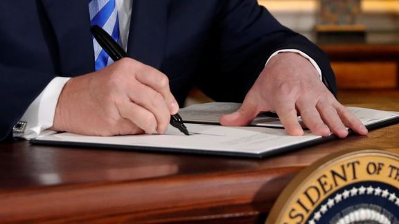 Former US president Donald Trump signing the withdrawal from the JCPOA in May 2018