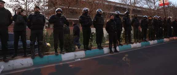Members of the Iranian police stand guard at a protest in front of the British embassy following anti-government protests in Tehran, Iran, January 14, 2026