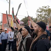 Machete-wielding men at IRGC-backed rally revive scrutiny of crackdowns