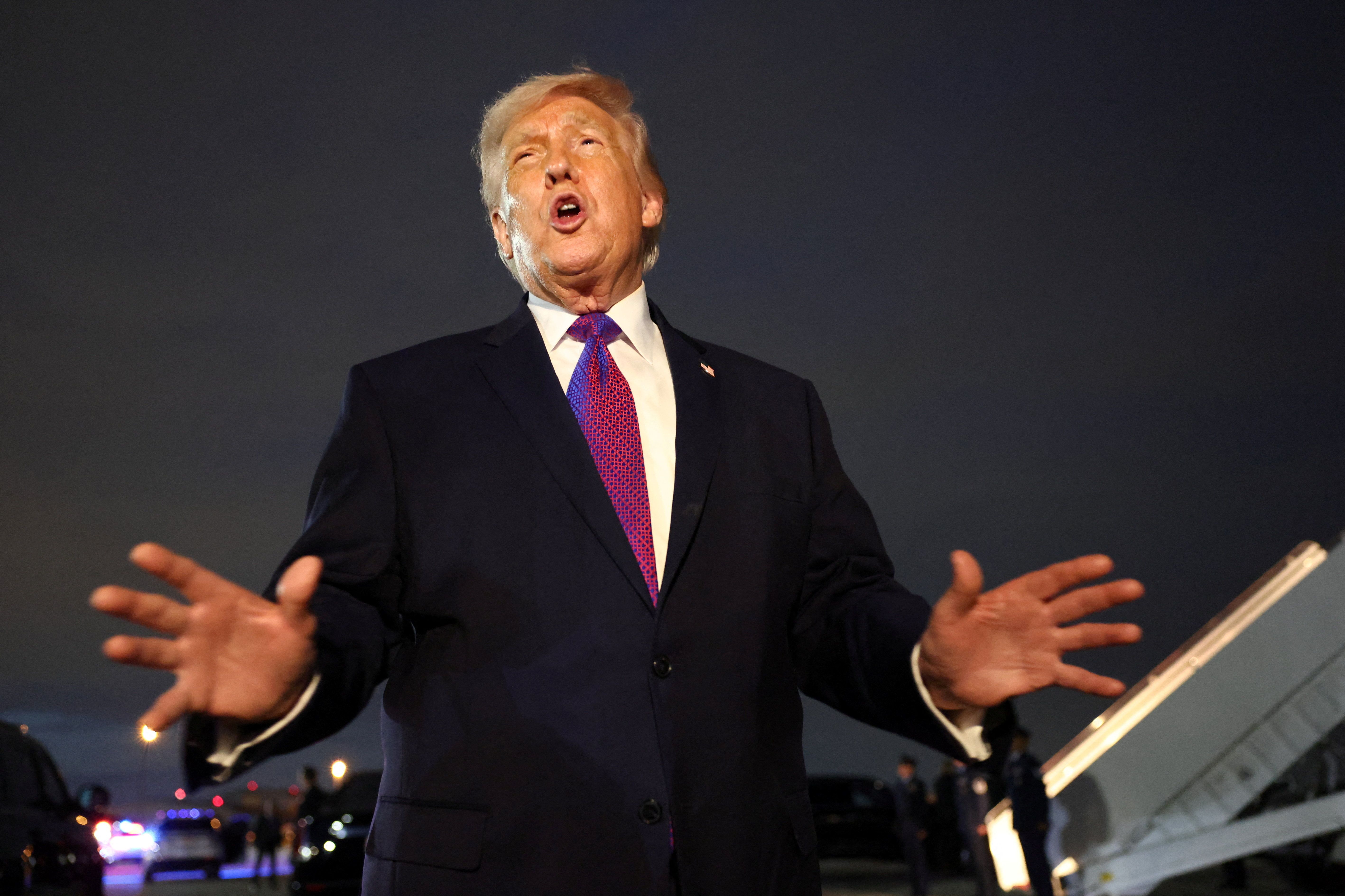 US President Donald Trump talks to the media upon his arrival at Joint Base Andrews, Maryland, US, March 11, 2026