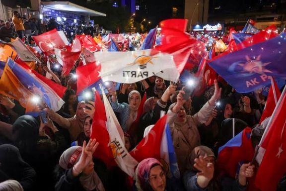 Presidential and parliamentary elections in Turkey Supporters of Turkish President Tayyip Erdogan wave flags outside the AK Party headquarters, in Ankara, Turkey May 15, 2023.