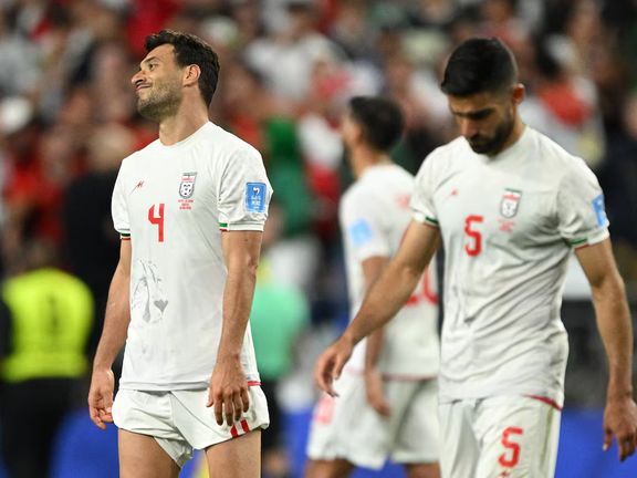 Iran's Shoja Khalilzadeh looks dejected after his last minute goal against Egypt gets disallowed after a VAR review, June 26, 2026