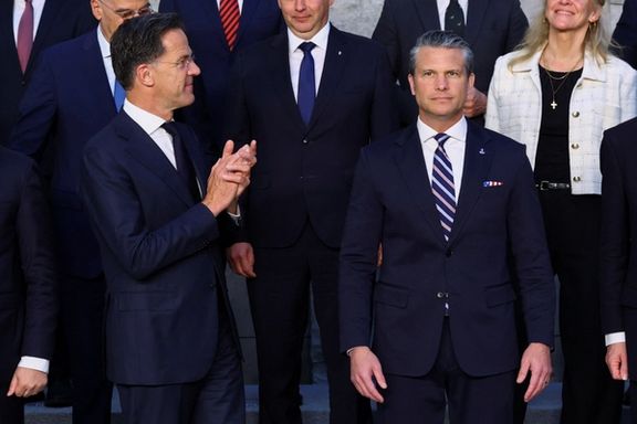 NATO Secretary General Mark Rutte gestures next to U.S. Defense Secretary Pete Hegseth, as they pose for a family photo during a meeting of NATO Defence Ministers at the alliance's headquarters in Brussels, Belgium, June 18, 2026.