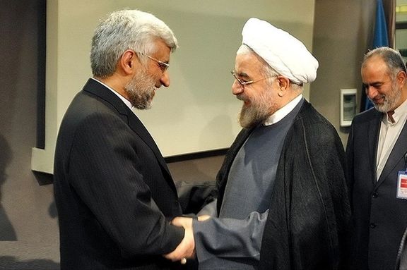 Member of Expediency Discernment Council Saeed Jalili (left) and former president Hassan Rouhani