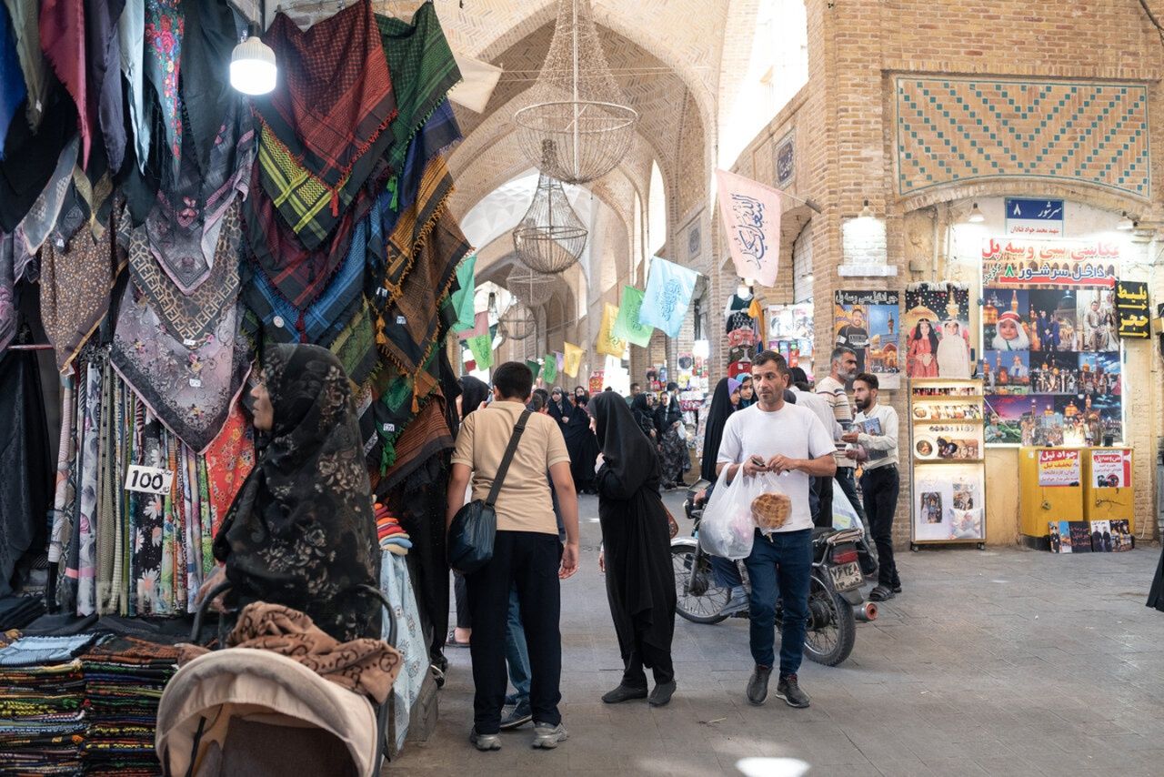 People walk and shop at Mashad's grand bazaar in northeast Iran, September 28, 2025