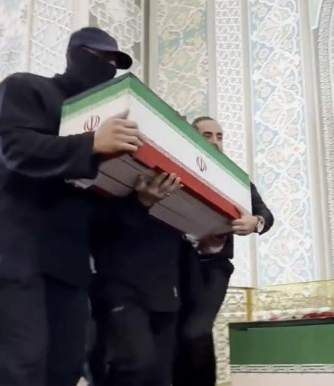 Mystery figure at Khamenei funeral identified as injured grandson - report
