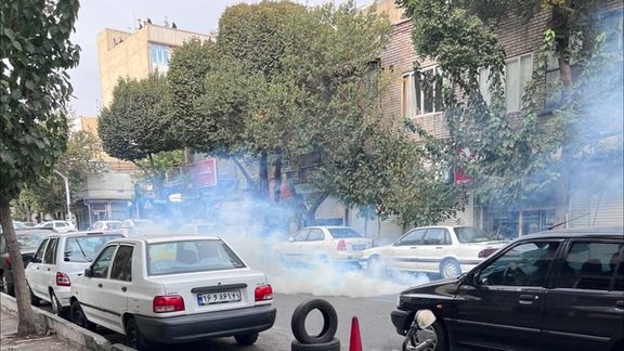 Security forces use tear gas against people near the girls' school