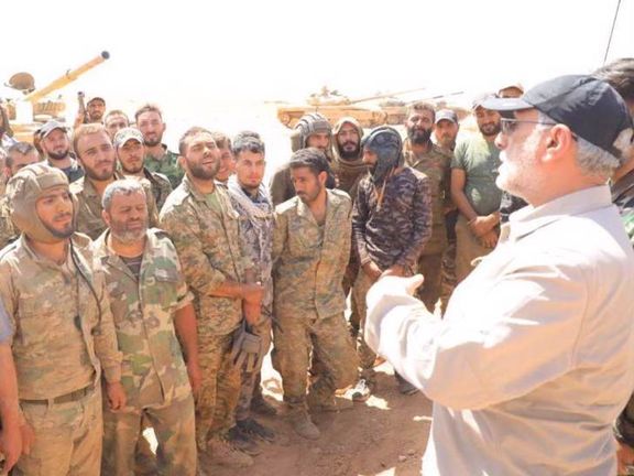 A photo released by Iranian media of IRGC’s Quds Force Commander Esmail Qaani addressing fighters in an undisclosed location in Syria
