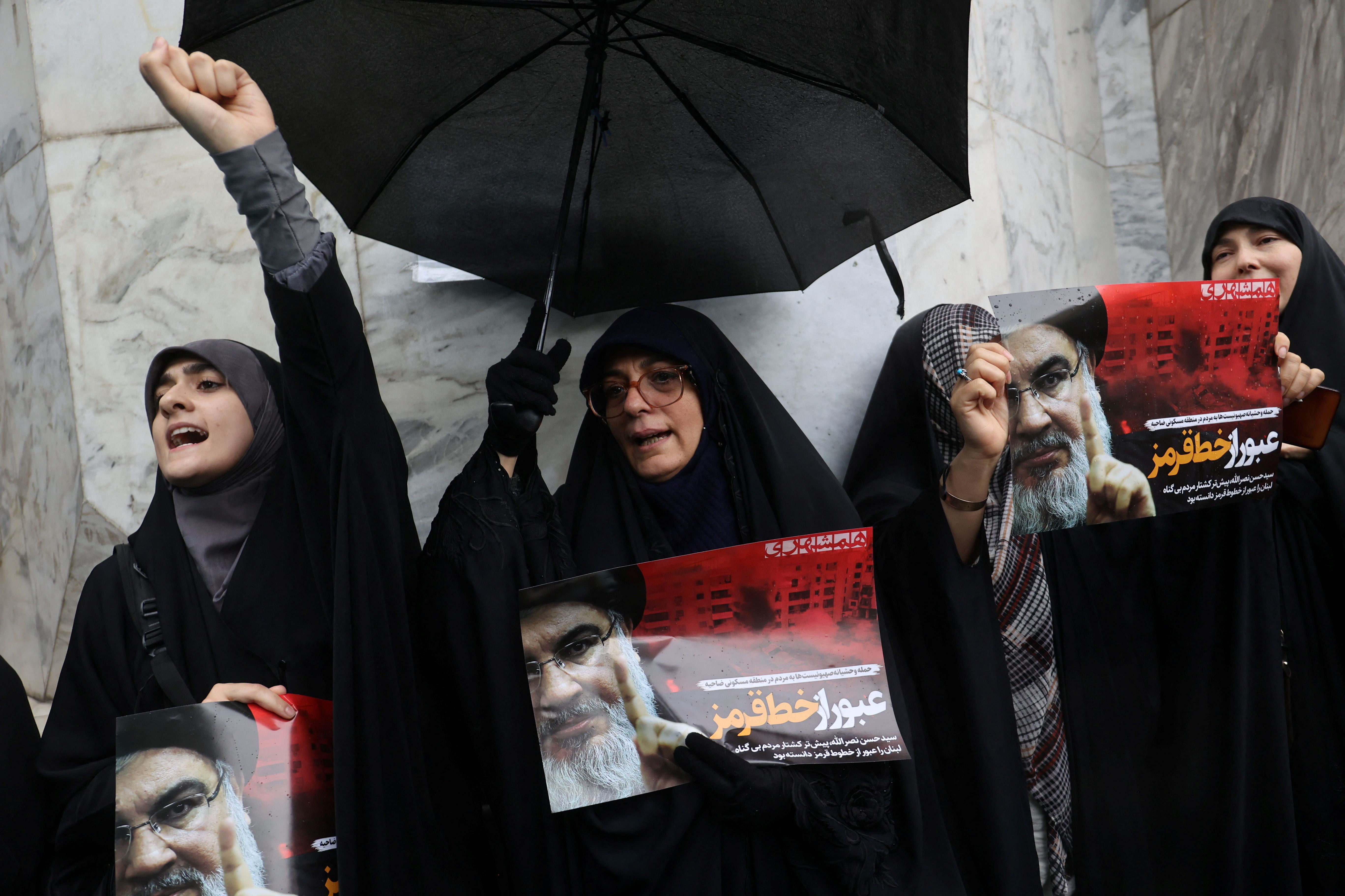 People gather to mourn following the announcement of the death of Lebanon's Hezbollah leader Sayyed Hassan Nasrallah, in Tehran, Iran September 28, 2024. 